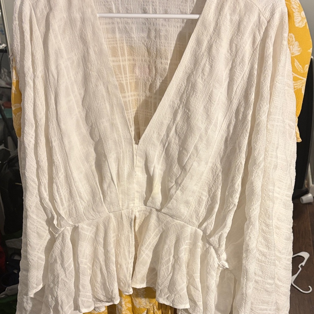 White blouse with flowy sleeves